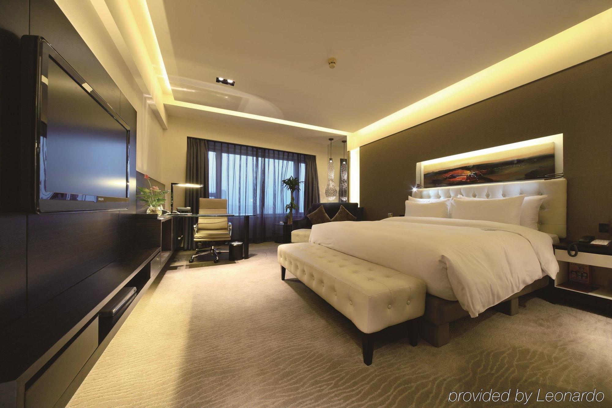 Furama Hotel Dalian Habitación foto